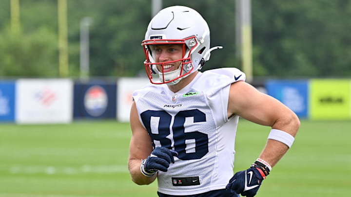Jun 9, 2025; Foxborough, MA, USA; New England Patriots wide receiver Efton Chism III (86) reacts after completing a drill during minicamp at Gillette Stadium. Mandatory Credit: Eric Canha-Imagn Images