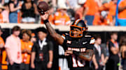 Oklahoma State Cowboys quarterback Sam Jackson V (18) warms up before a college football game between the Oklahoma State Cowboys (OSU) and the Houston Cougars at Boone Pickens Stadium in Stillwater, Okla., Saturday, Oct. 11, 2025.