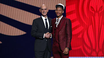 Jeremiah Fears, Adam Silver at the 2025 NBA Draft - Round One