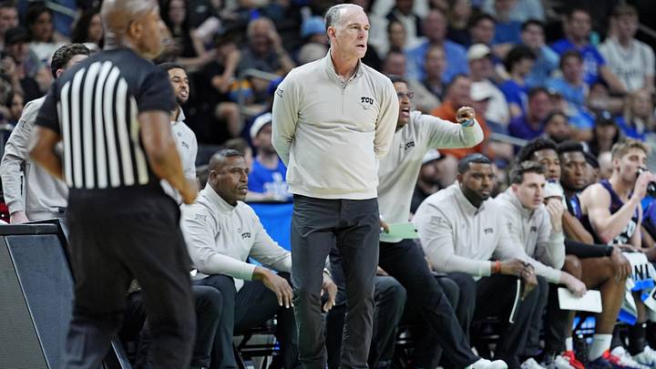 Mar 21, 2026; Greenville, SC, USA; Texas Christian University Horned Frogs head coach Jamie Dixon looks on during the first half against the Duke Blue Devils during a second round game of the men's 2026 NCAA Tournament at Bon Secours Wellness Arena. Mandatory Credit: Jim Dedmon-Imagn Images