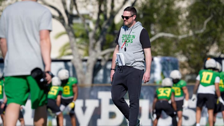 Oregon head coach Dan Lanning walks the field as the Oregon Ducks practice at Barry University ahead of the Orange Bowl on Dec. 30, 2025, in Miami, Florida.