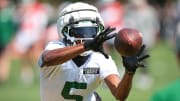 Jul 27, 2024; Florham Park, NJ, USA; New York Jets wide receiver Garrett Wilson (5) catches the ball during a drill during training camp at Atlantic Health Jets Training Center. Mandatory Credit: Vincent Carchietta-USA TODAY Sports