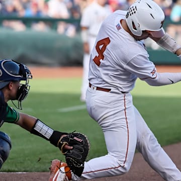 Jun 17, 2022; Omaha, NE, USA; Texas Longhorns catcher Silas Ardoin (4) at bat in the second inning against the Notre Dame Fighting Irish at Charles Schwab Field.