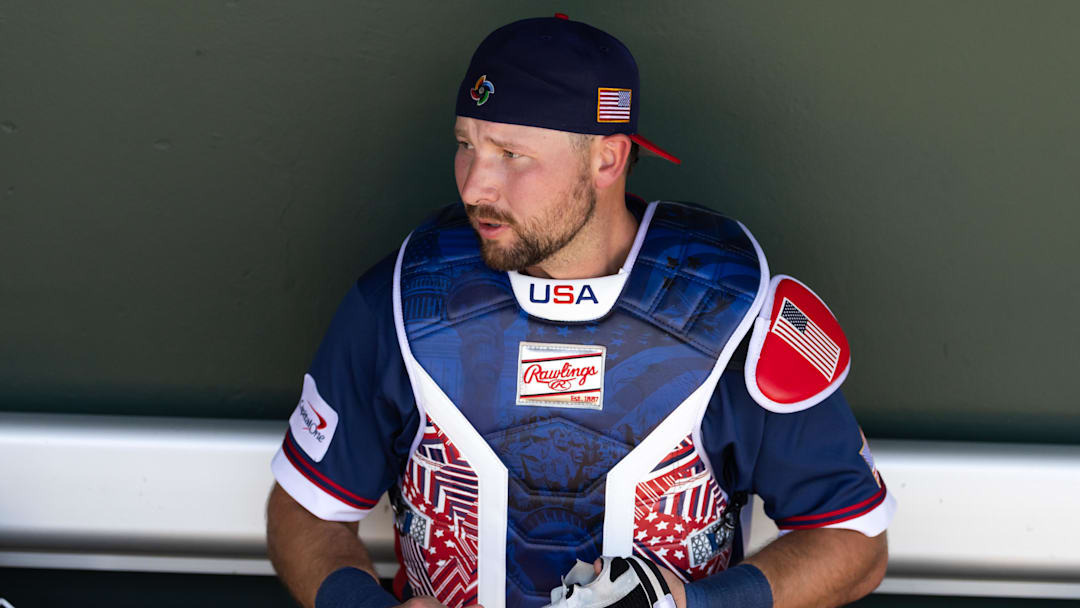 Cal Raleigh against the San Francisco Giants during a spring training game at Scottsdale Stadium. 