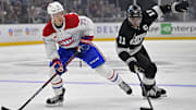 Feb 5, 2025; Los Angeles, California, USA;Montreal Canadiens center Jake Evans (71) and Los Angeles Kings center Anze Kopitar (11) chase down the puck in the second period at Crypto.com Arena. Mandatory Credit: Jayne Kamin-Oncea-Imagn Images