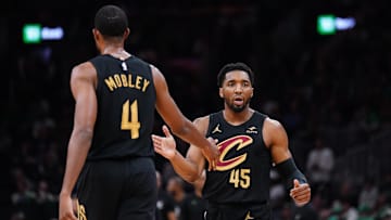 May 9, 2024; Boston, Massachusetts, USA; Cleveland Cavaliers guard Donovan Mitchell (45) reacts after a basket buy forward Evan Mobley (4) against the Boston Celtics in the first quarter during game two of the second round for the 2024 NBA playoffs at TD Garden. Mandatory Credit: David Butler II-Imagn Images