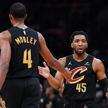 May 9, 2024; Boston, Massachusetts, USA; Cleveland Cavaliers guard Donovan Mitchell (45) reacts after a basket buy forward Evan Mobley (4) against the Boston Celtics in the first quarter during game two of the second round for the 2024 NBA playoffs at TD Garden. Mandatory Credit: David Butler II-Imagn Images