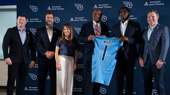 Cam Ward, second right, poses for pictures after being introduced as the Tennessee Titans first-round pick and number one overall pick n the NFL Draft at Ascension Saint Thomas Sports Park in Nashville, Tenn., Friday, April 25, 2025. Those pictured are, from left, Chad Brinker, president of football operations, Brian Callahan, head coach, Amy Adams Strunk, NFL Hall of Fame quarterback Warren Moon, Ward and Mike Borgonzi, general manager. Mandatory Credit: The Tennessean/USA TODAY NETWORK via