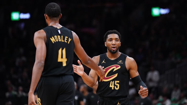 May 9, 2024; Boston, Massachusetts, USA; Cleveland Cavaliers guard Donovan Mitchell (45) reacts after a basket buy forward Evan Mobley (4) against the Boston Celtics in the first quarter during game two of the second round for the 2024 NBA playoffs at TD Garden. Mandatory Credit: David Butler II-USA TODAY Sports