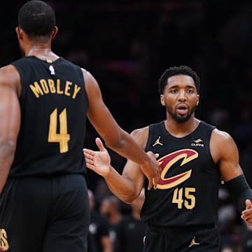 May 9, 2024; Boston, Massachusetts, USA; Cleveland Cavaliers guard Donovan Mitchell (45) reacts after a basket buy forward Evan Mobley (4) against the Boston Celtics in the first quarter during game two of the second round for the 2024 NBA playoffs at TD Garden. Mandatory Credit: David Butler II-Imagn Images