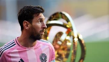 Lionel Messi, Inter Miami CF captain, walks by the FIFA Club World Cup trophy Saturday before the Herons' scoreless draw against Egyptian champions Al Ahly FC.
