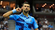 Aug 30, 2024; Flushing, NY, USA;  Novak Djokovic (SRB) works the crowd while playing Alexei Popyrin (AUS) on day five of the 2024 U.S. Open tennis tournament at USTA Billie Jean King National Tennis Center. Mandatory Credit: Robert Deutsch-Imagn Images