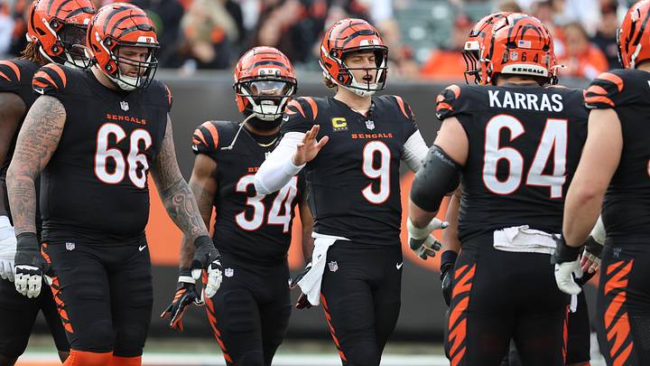 Dec 28, 2025; Cincinnati, Ohio, USA; Cincinnati Bengals quarterback Joe Burrow (9) celebrates with teammates after a touchdown during the first half against the Arizona Cardinals at Paycor Stadium. Mandatory Credit: Joseph Maiorana-Imagn Images