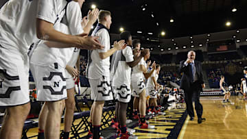 Ed DeChellis and the Navy Midshipmen basketball team.