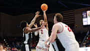 Nov 27, 2025; San Diego, CA, USA; Wisconsin Badgers guard Nick Boyd (2) shoots the ball against the Providence Friars during the second half at Jenny Craig Pavilion.