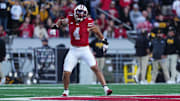 Oct 11, 2025; Madison, Wisconsin, USA; Wisconsin Badgers linebacker Tackett Curtis (4) celebrates a defensive stop against the Iowa Hawkeyes in the first quarter at Camp Randall Stadium