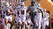 Dec 31, 2024; Orlando, FL, USA; South Carolina Gamecocks quarterback LaNorris Sellers (16) leads his team agains the Illinois Fighting Illini before the game at Camping World Stadium. Mandatory Credit: Jeremy Reper-Imagn Images