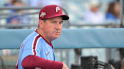 Oct 8, 2025; Los Angeles, California, USA; Philadelphia Phillies manager Rob Thomson (49) looks on before the game against the Los Angeles Dodgers during game three of the NLDS round for the 2025 MLB playoffs at Dodger Stadium. 