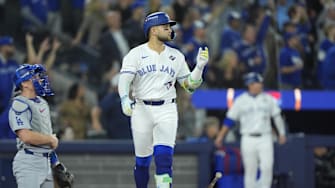Nov 1, 2025; Toronto, Ontario, CAN; Toronto Blue Jays designated hitter Bo Bichette (11) reacts after hitting a three run home run against the Los Angeles Dodgers in the third inning during game seven of the 2025 MLB World Series at Rogers Centre. Mandatory Credit: John E. Sokolowski-Imagn Images