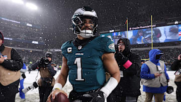 Jan 19, 2025; Philadelphia, Pennsylvania, USA; Philadelphia Eagles quarterback Jalen Hurts (1) looks on from the field after defeating the Los Angeles Rams in a 2025 NFC divisional round game at Lincoln Financial Field. Mandatory Credit: Bill Streicher-Imagn Images