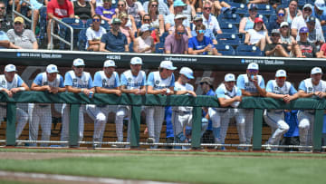 Jun 18, 2024; Omaha, NE, USA; North Carolina Tar Heels players looks on during the fourth inning against the Florida State Seminoles at Charles Schwab Field Omaha. Mandatory Credit: Steven Branscombe-USA TODAY Sports