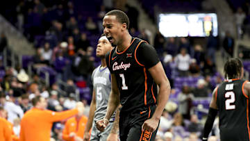 Feb 12, 2025; Fort Worth, Texas, USA; Oklahoma State Cowboys guard Bryce Thompson (1) reacts during the second half against the TCU Horned Frogs at Ed and Rae Schollmaier Arena. Mandatory Credit: Kevin Jairaj-Imagn Images