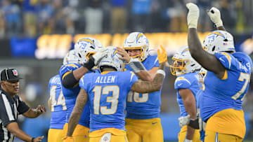 Nov 9, 2025; Inglewood, California, USA; Los Angeles Chargers wide receiver Keenan Allen (13) celebrates with teammates after a reception against the Pittsburgh Steelers during the fourth quarter of the game at SoFi Stadium. Allen set a franchise record for reception with this catch. Mandatory Credit: Jayne Kamin-Oncea-Imagn Images