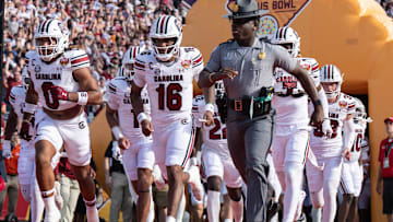 Dec 31, 2024; Orlando, FL, USA; South Carolina Gamecocks quarterback LaNorris Sellers (16) leads his team agains the Illinois Fighting Illini before the game at Camping World Stadium. Mandatory Credit: Jeremy Reper-Imagn Images