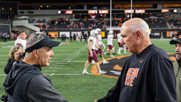 Oct 18, 2025; Corvallis, Oregon, USA; Lafayette Leopards head coach John Troxell (left) and Oregon State Beavers interim head coach Robb Akey shake hands at midfield after the game at Reser Stadium. Mandatory Credit: Craig Strobeck-Imagn Images