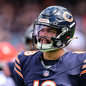 Aug 17, 2024; Chicago, Illinois, USA; Chicago Bears quarterback Caleb Williams (18) looks on against the Cincinnati Bengals during the first quarter at Soldier Field. Mandatory Credit: Daniel Bartel-Imagn Images