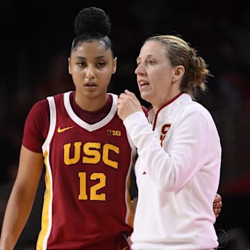 JuJu Watkins and Lindsay Gottlieb speak during USC's game against UCLA.