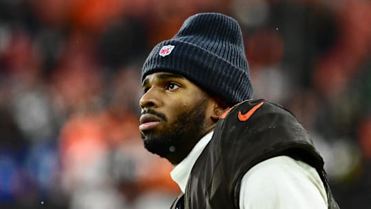 Dec. 7, 2025; Cleveland, Ohio, USA; Cleveland Browns quarterback Shedeur Sanders (12) watches from the sidelines late in the fourth quarter against the Tennessee Titans at Huntington Bank Field.