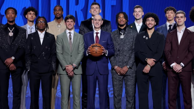 Jun 26, 2024; Brooklyn, NY, USA; NBA commissioner Adam Silver poses for photos with the 2024 draft class.