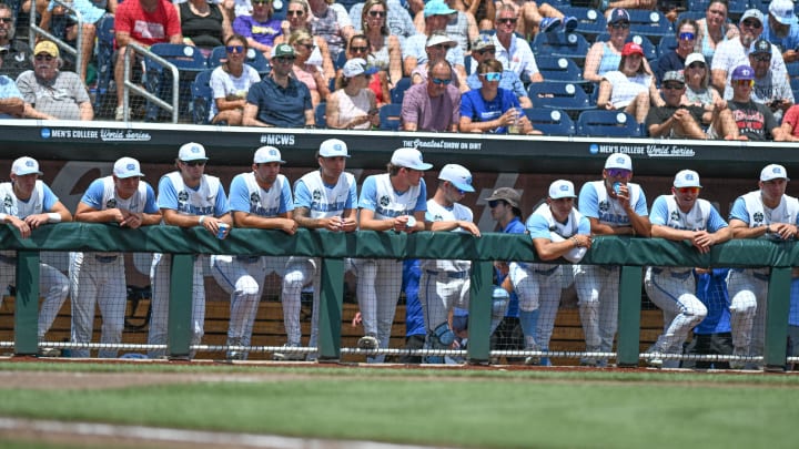 Jun 18, 2024; Omaha, NE, USA; North Carolina Tar Heels players looks on during the fourth inning against the Florida State Seminoles at Charles Schwab Field Omaha. Mandatory Credit: Steven Branscombe-USA TODAY Sports