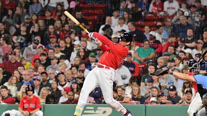 Sep 27, 2024; Boston, Massachusetts, USA; Boston Red Sox first baseman Triston Casas (36) hits a single against the Tampa Bay Rays during fourth inning at Fenway Park. Mandatory Credit: Eric Canha-Imagn Images