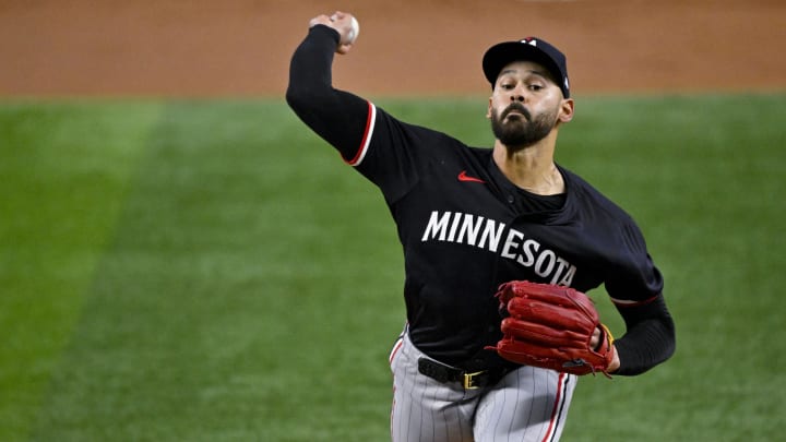 Minnesota Twins starting pitcher Pablo Lopez (49) pitches against the Texas Rangers during the first inning at Globe Life Field in Arlington, Texas, on Aug. 28, 2024.