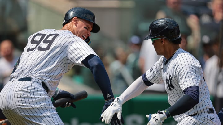 Aug 11, 2024; Bronx, New York, USA;  New York Yankees right fielder Juan Soto (22) celebrates with New York Yankees center fielder Aaron Judge (99) after hitting a solo home run during the third inning against the Texas Rangers at Yankee Stadium. Mandatory Credit: Vincent Carchietta-USA TODAY Sports