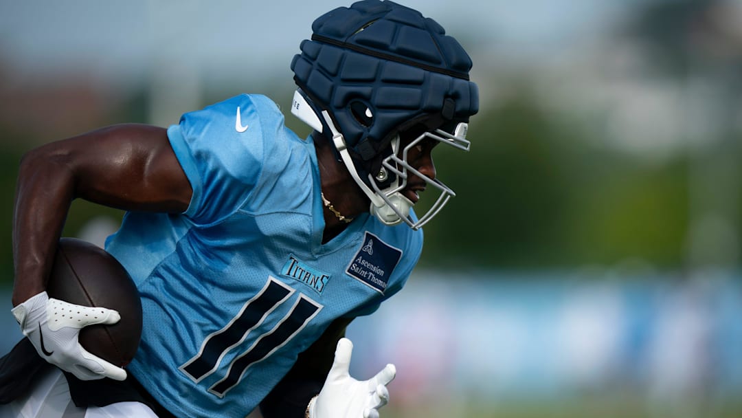 Tennessee Titans wide receiver Van Jefferson (11) runs after a catch during training camp at Ascension Saint Thomas Sports Park in Nashville, Tenn., Tuesday, July 29, 2025.