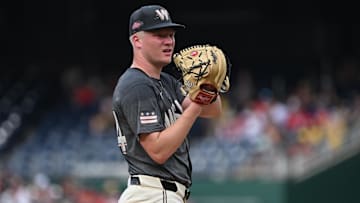 Aug 3, 2024; Washington, District of Columbia, USA; Washington Nationals starting pitcher DJ Herz (74) prepares to throw a pitch against the Milwaukee Brewers during the first inning at Nationals Park