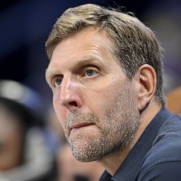 May 19, 2025; Arlington, Texas, USA;  Former NBA player Dirk Nowitzki watches the game between the Dallas Wings and the Seattle Storm during the first half at College Park Center. Mandatory Credit: Jerome Miron-Imagn Images