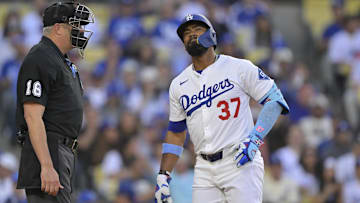 Jun 20, 2025; Los Angeles, California, USA;  Los Angeles Dodgers outfielder Teoscar Hernandez (37) reacts to a call out on strike during the first inning against the Washington Nationals at Dodger Stadium. Mandatory Credit: Jayne Kamin-Oncea-Imagn Images