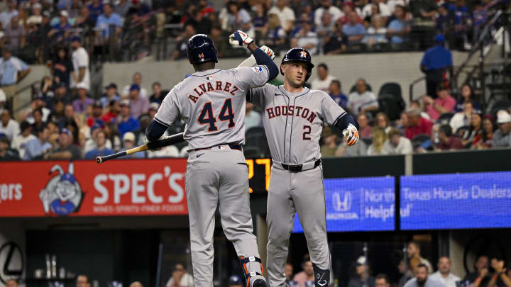 Aug 5, 2024; Arlington, Texas, USA; Houston Astros designated hitter Yordan Alvarez (44) and third baseman Alex Bregman (2) celebrates after Bregman hits a home run against the Texas Rangers during the third inning at Globe Life Field. 