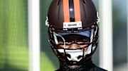 Cleveland Browns defensive end Sam Kamara models a new alternate helmet during training camp 