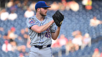 Jul 3, 2024; Washington, District of Columbia, USA; New York Mets starting pitcher Christian Scott (45) prepares to throw a pitch against the Washington Nationals during the first inning at Nationals Park. Mandatory Credit: Rafael Suanes-USA TODAY Sports