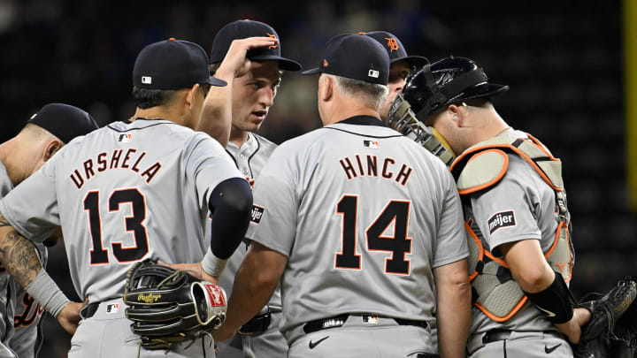 Jun 3, 2024; Arlington, Texas, USA; Detroit Tigers manager A.J. Hinch (14) checks on relief pitcher Beau Brieske (4) during the ninth inning against the Texas Rangers at Globe Life Field.