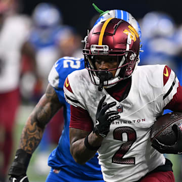 Jan 18, 2025; Detroit, Michigan, USA; Washington Commanders wide receiver Dyami Brown (2) runs the ball during the first quarter against Detroit Lions in a 2025 NFC divisional round game at Ford Field. Mandatory Credit: Lon Horwedel-Imagn Images
