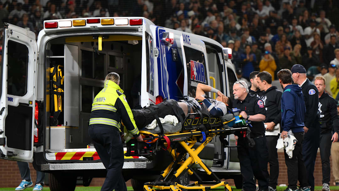 May 12, 2025; Seattle, Washington, USA; New York Yankees third baseman Oswaldo Cabrera (95) is loaded into an ambulance after a leg injury while scoring a run against the Seattle Mariners during the eighth inning at T-Mobile Park. May 12, 2025; Seattle, Washington, USA; New York Yankees third baseman Oswaldo Cabrera (95) is loaded into an ambulance after a leg injury while scoring a run against the Seattle Mariners during the eighth inning at T-Mobile Park.