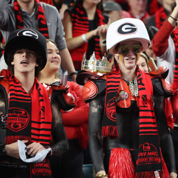 Dec 30, 2023; Miami Gardens, FL, USA; Georgia Bulldogs fans react after defeating the Florida State Seminoles in the 2023 Orange Bowl at Hard Rock Stadium. Mandatory Credit: Nathan Ray Seebeck-USA TODAY Sports