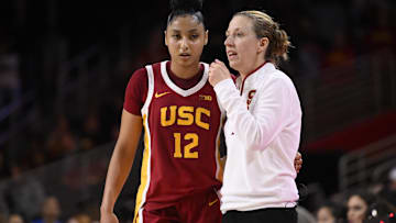 Feb 13, 2025; Los Angeles, California, USA; USC Trojans guard JuJu Watkins (12) and head coach Lindsay Gottlieb during the second half against the UCLA Bruins at Galen Center. Mandatory Credit: Robert Hanashiro-Imagn Images