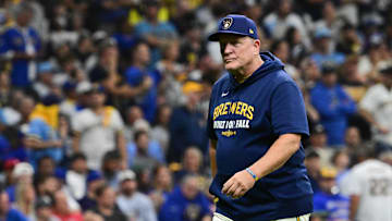 Oct 6, 2025; Milwaukee, Wisconsin, USA; Milwaukee Brewers manager Pat Murphy (49) walks back to the dugout after making a pitching change during the eighth inning against the Chicago Cubs during game two of the NLDS round for the 2025 MLB playoffs at American Family Field. Mandatory Credit: Benny Sieu-Imagn Images